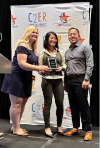 SDI team accepting 2025 Economic and Workforce Development Research Award